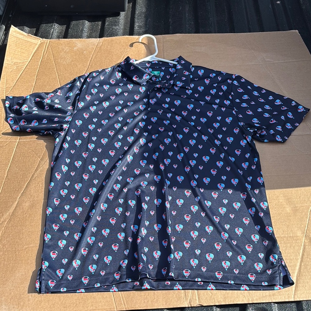 Blue Polo with Geometric Pattern and Relaxed Fit